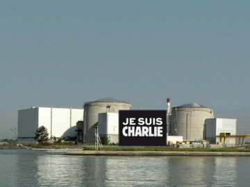 AKW Fessenheim mit Banner Je suis charlie - Karikatur: Samy